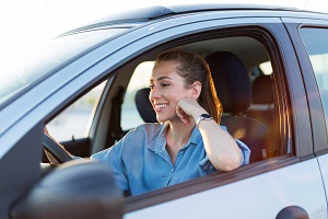 woman sitting in car